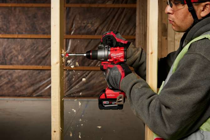 Man using a Milwaukee drill