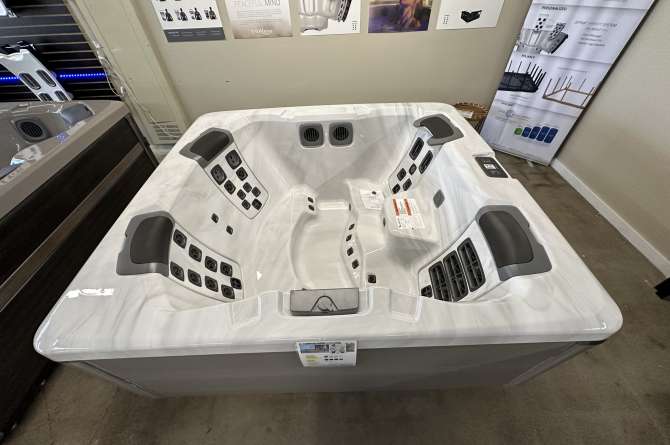 Bullfrog Spa in a showroom.