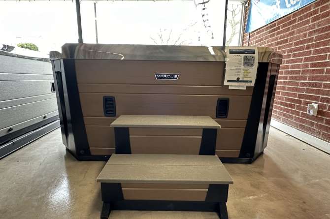 A Vector 21 series spa in an indoor showroom.