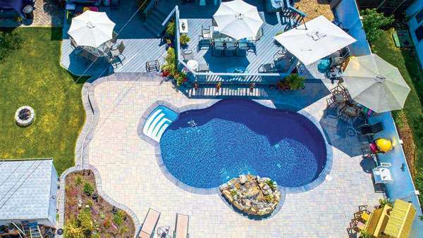 An aerial shot of a radiant inground pool.